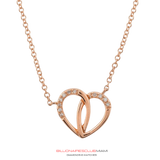 All of the VS diamonds are hand-set by a master diamond setter in the highest quality craftsmanship. This piece is made of solid gold.   Our handcrafted Gold Heart Diamond Necklace contain famous designs seen on various entertainers and celebrities around the world.