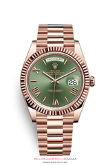 THE OYSTER PERPETUAL DAY-DATE 40 IN 18 CT EVEROSE GOLD WITH A FLUTED BEZEL AND A PRESIDENT BRACELET.