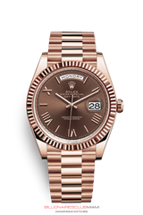 THE OYSTER PERPETUAL DAY-DATE 40 IN 18 CT EVEROSE GOLD WITH A FLUTED BEZEL AND A PRESIDENT BRACELET.