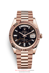 THE OYSTER PERPETUAL DAY-DATE 40 IN 18 CT EVEROSE GOLD WITH A FLUTED BEZEL AND A PRESIDENT BRACELET.