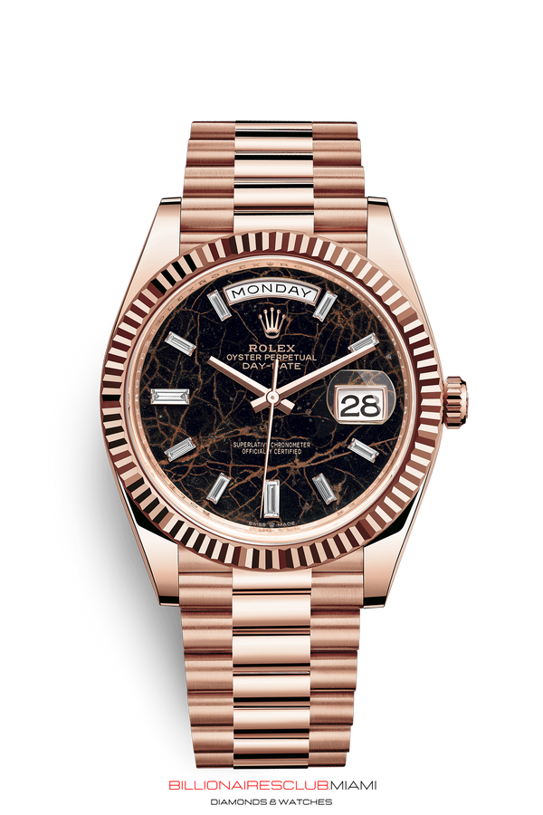 THE OYSTER PERPETUAL DAY-DATE 40 IN 18 CT EVEROSE GOLD WITH A FLUTED BEZEL AND A PRESIDENT BRACELET.