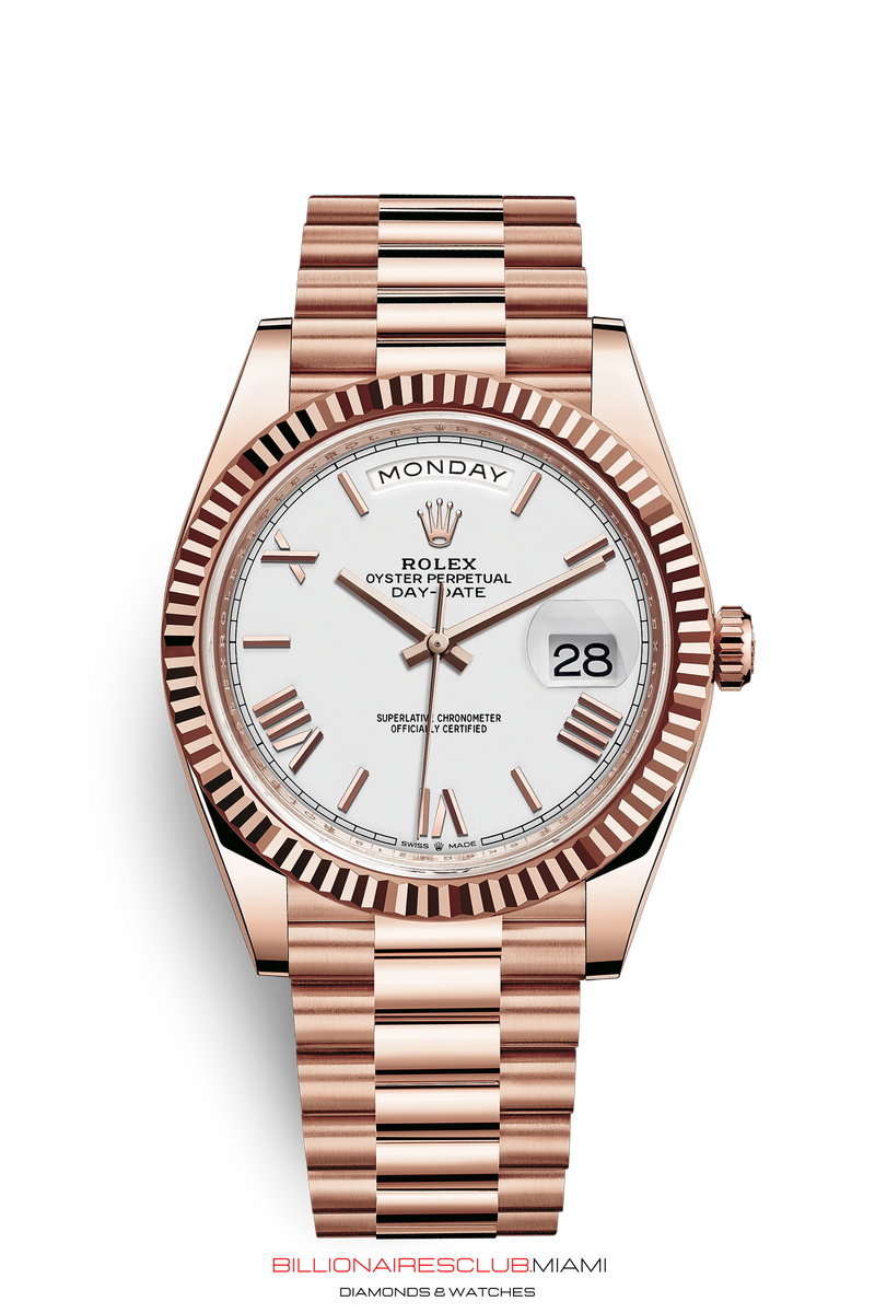 THE OYSTER PERPETUAL DAY-DATE 40 IN 18 CT EVEROSE GOLD WITH A FLUTED BEZEL AND A PRESIDENT BRACELET.