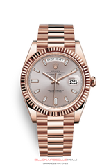 THE OYSTER PERPETUAL DAY-DATE 40 IN 18 CT EVEROSE GOLD WITH A FLUTED BEZEL AND A PRESIDENT BRACELET.