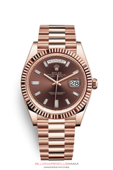 THE OYSTER PERPETUAL DAY-DATE 40 IN 18 CT EVEROSE GOLD WITH A FLUTED BEZEL AND A PRESIDENT BRACELET.