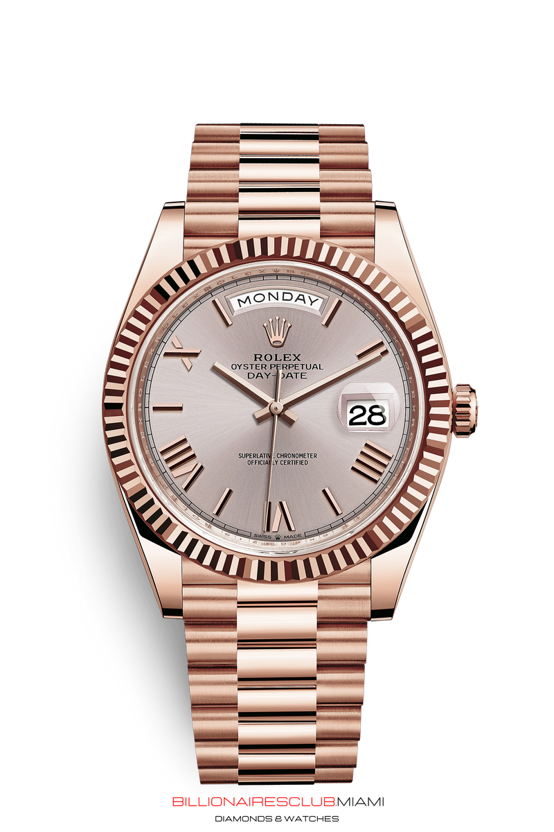 THE OYSTER PERPETUAL DAY-DATE 40 IN 18 CT EVEROSE GOLD WITH A FLUTED BEZEL AND A PRESIDENT BRACELET.